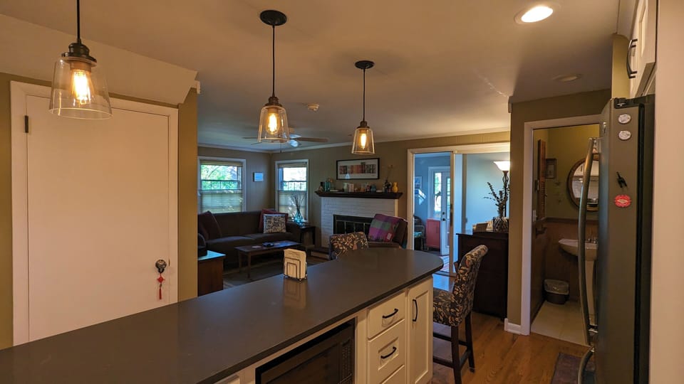 Updated kitchen open to TV room.