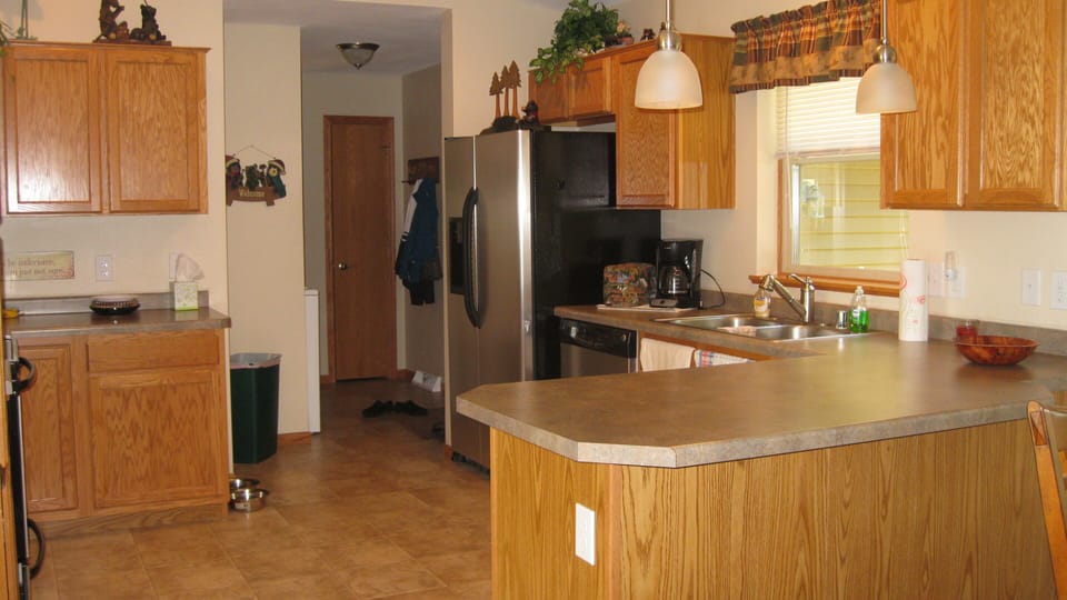 Full size appliances and dishwasher with other small appliances like Keurig
