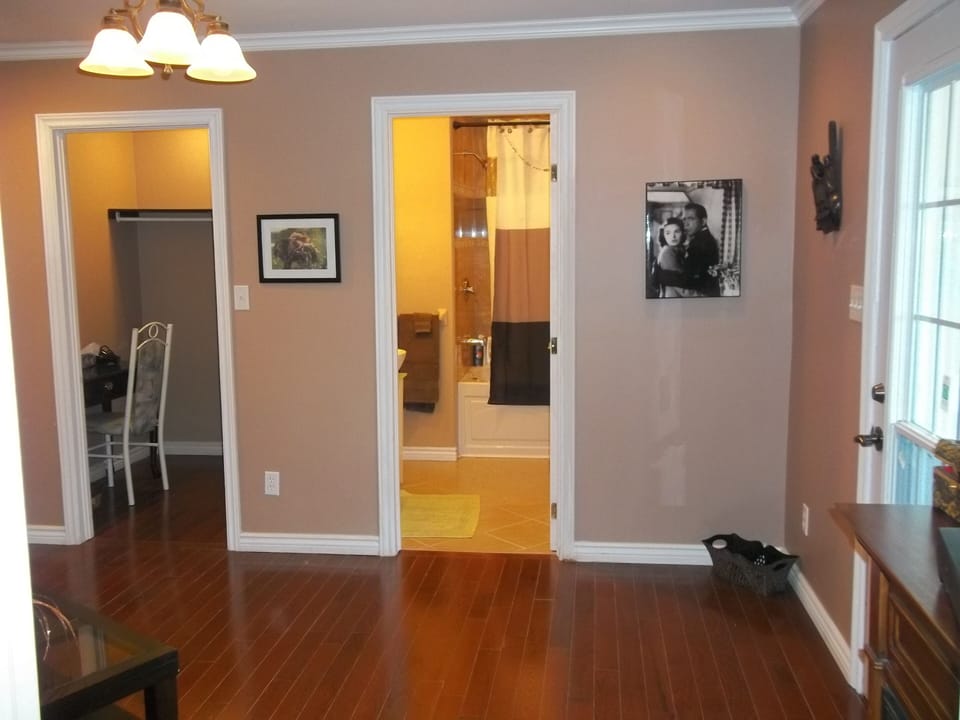Sitting Room of Lovers roost Suite, walkin closet to left, bathroom ahead