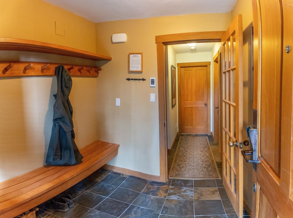 Front hall with heated floor to dry off your  gear.