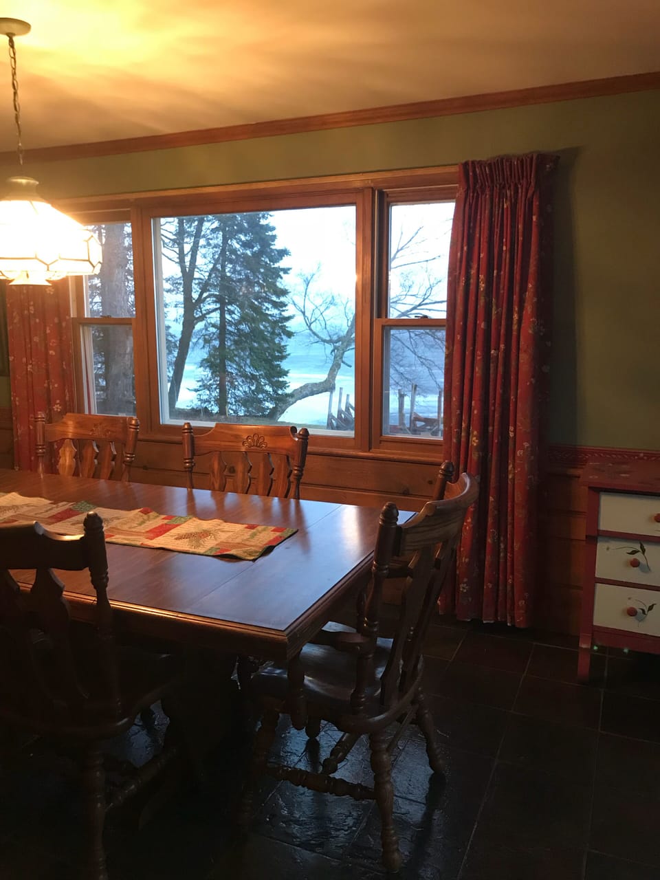 Dining room off the kitchen offers great view of the lake