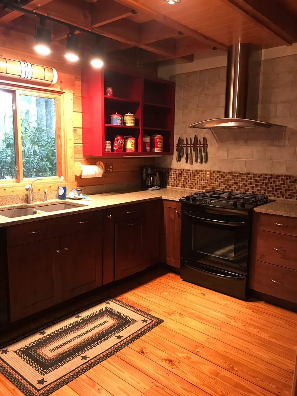 Kitchen with natural gas stove.