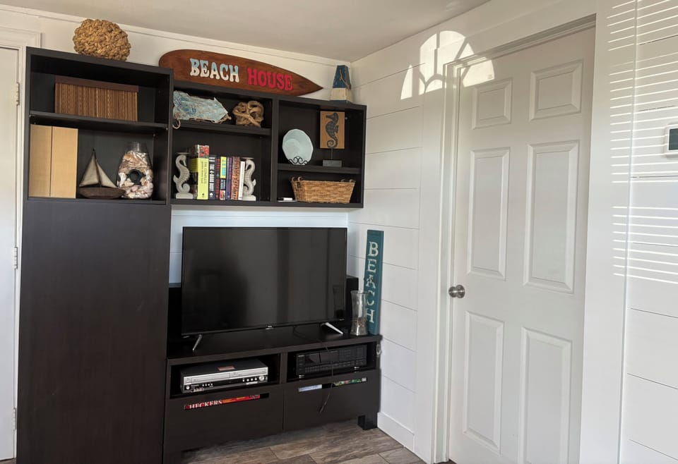 Entertainment area. Also laundry room & second bathroom through the door