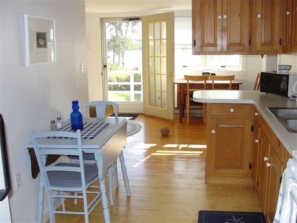 Kitchen looking into living room