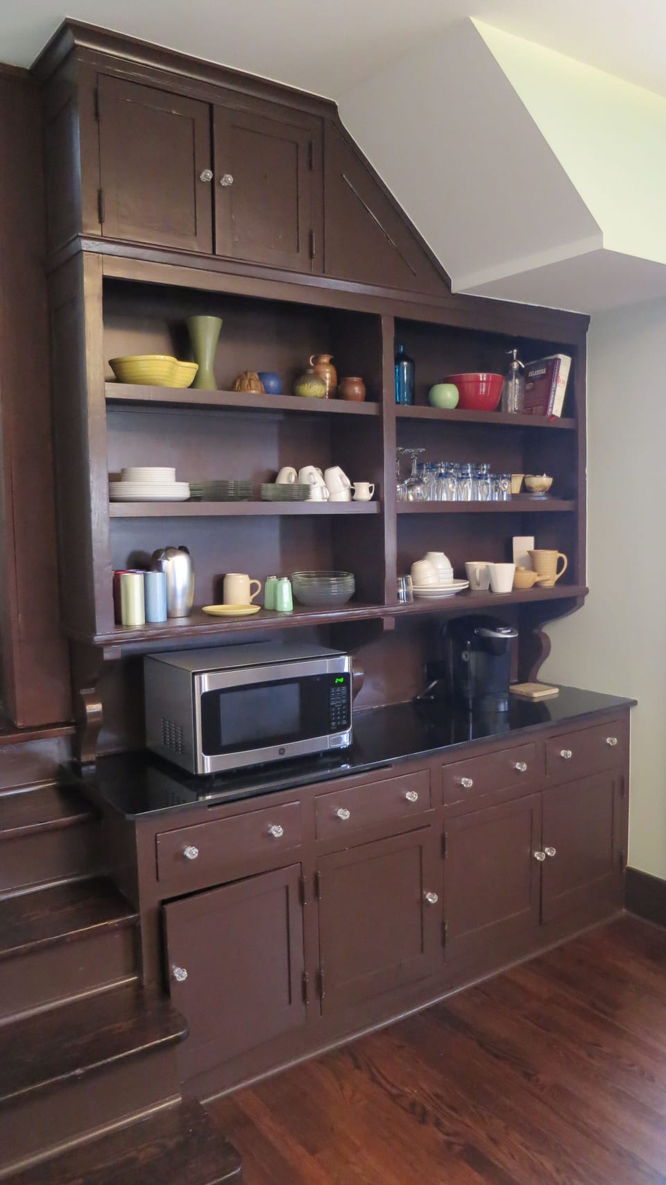 Kitchen (View #3 - original cabinetry, micro, Keurig, and stairs to 2nd floor)