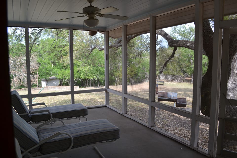 Porch off Bedroom 1/living area.  Porches have 2 very comfortable chaise lounges
