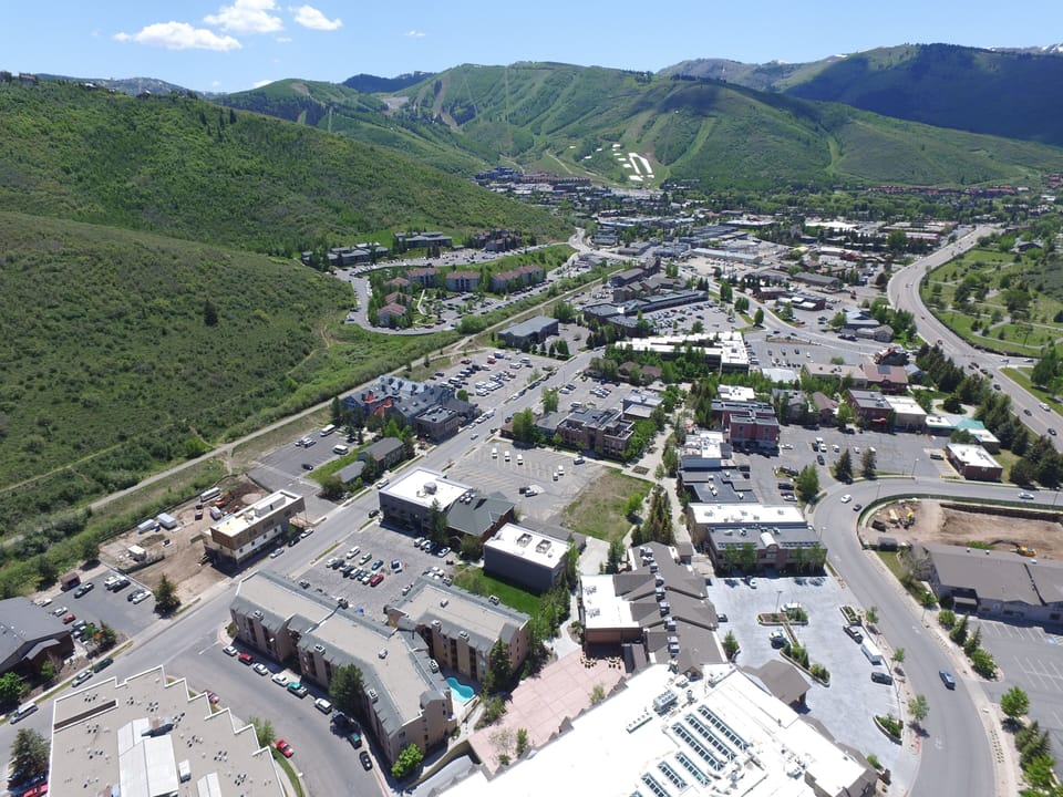 Carriage House is shown in the foreground with  PCMR and the town in background.