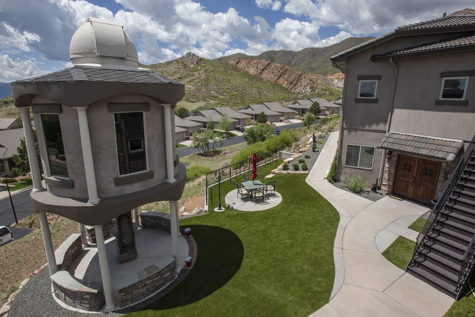 Observatory, outdoor seating, and game alley for corn hole and ladder golf.
