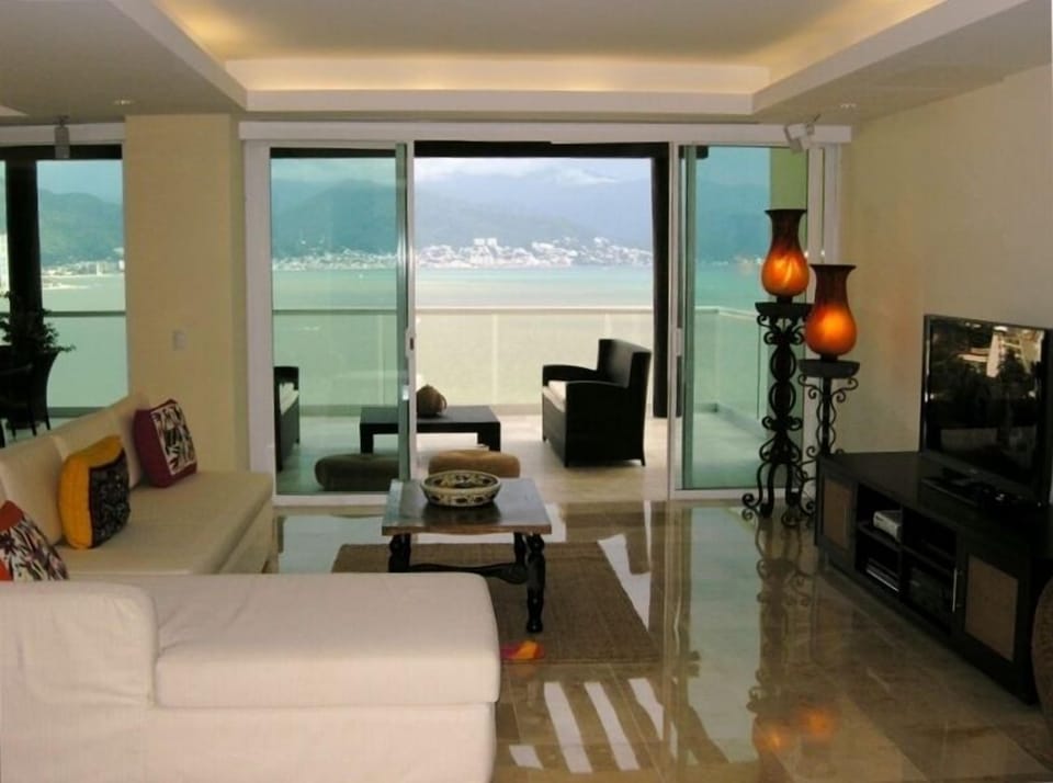 Living Room as you enter from the elevator. State of the Art home theater.