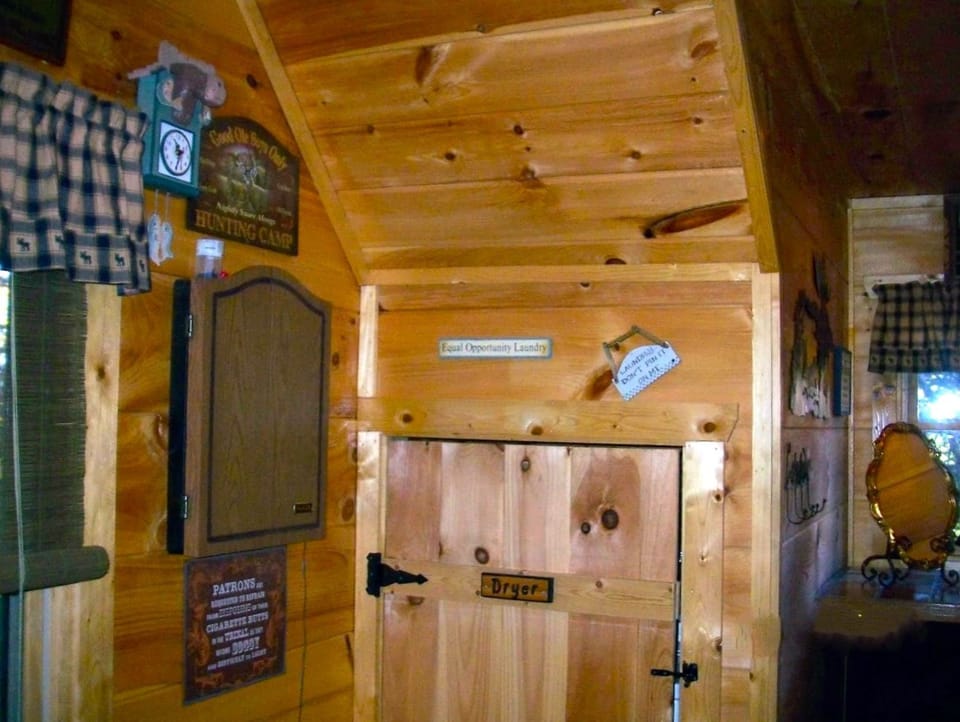 The loft has an electronic dart board, pool table, full bed, full-size W&D