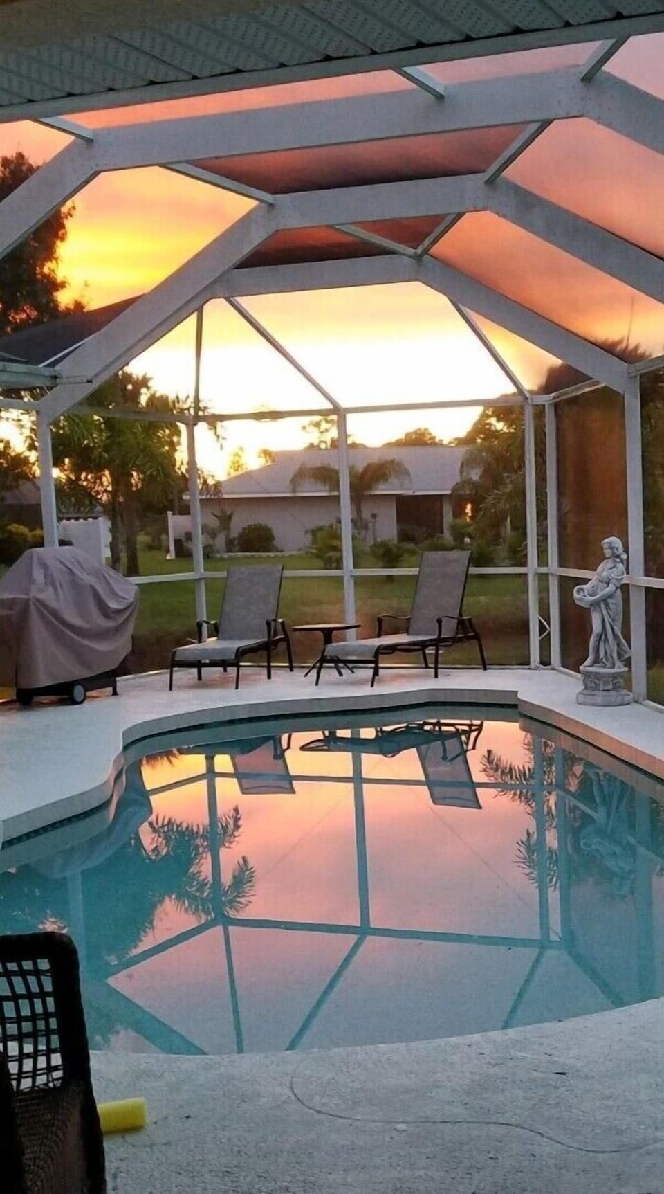 Enjoy this beautiful sunset right in your back yard. 5 rooms open to lovely pool