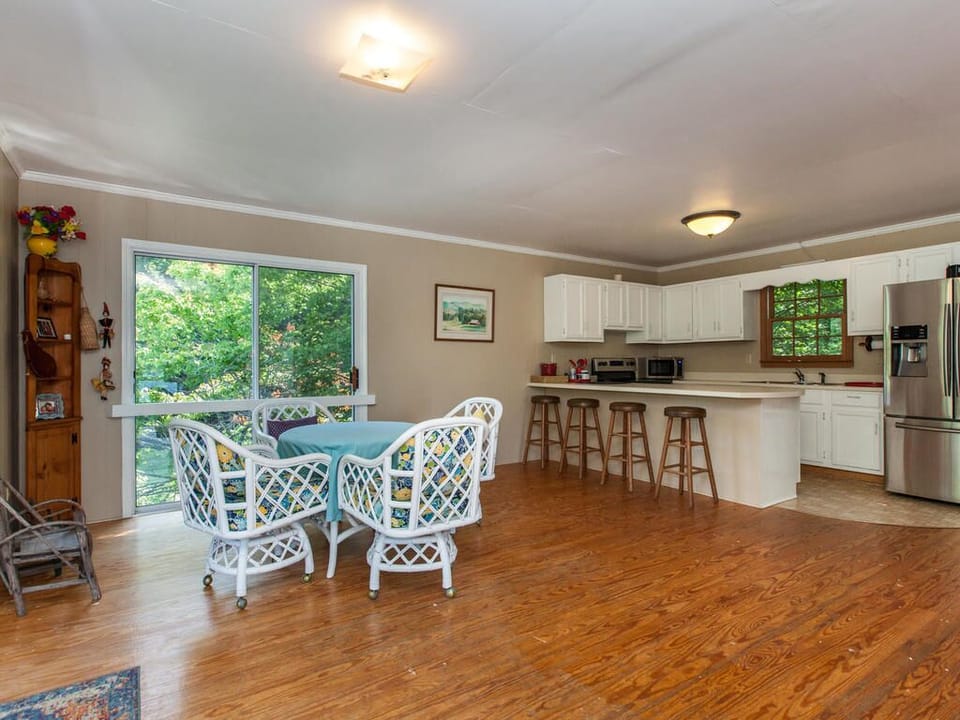 Inside the boathouse has a full kitchen, dining table