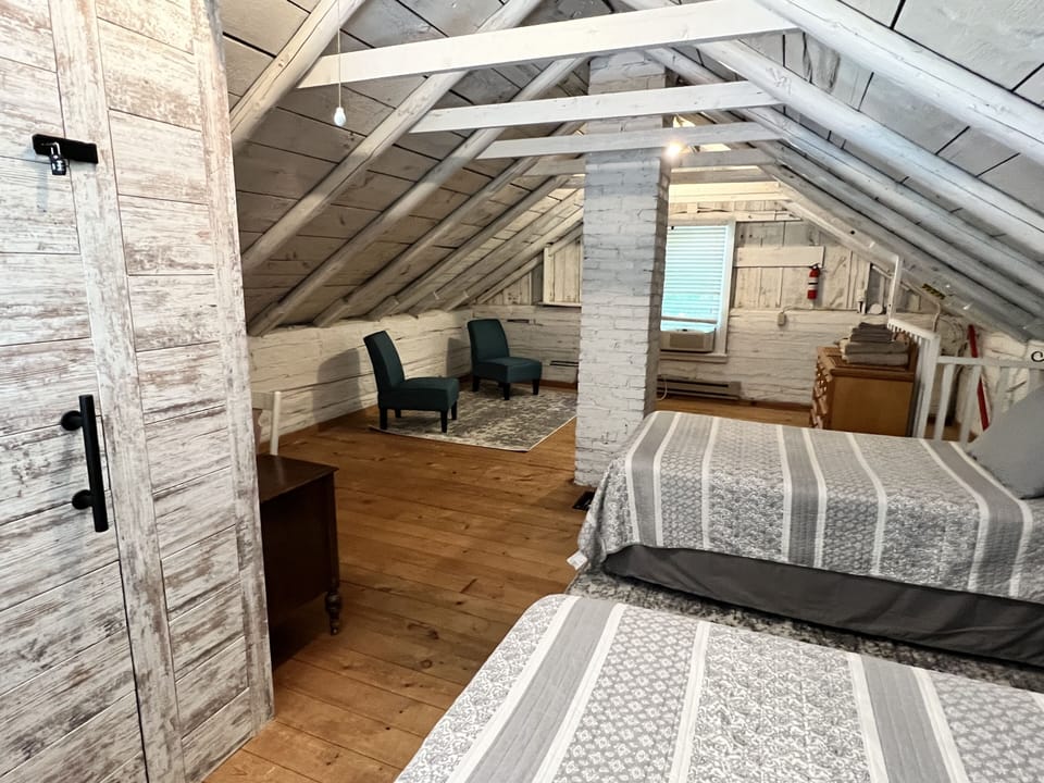 Upstairs sleeping loft (2 twin beds).  Steep and narrow stairway to loft