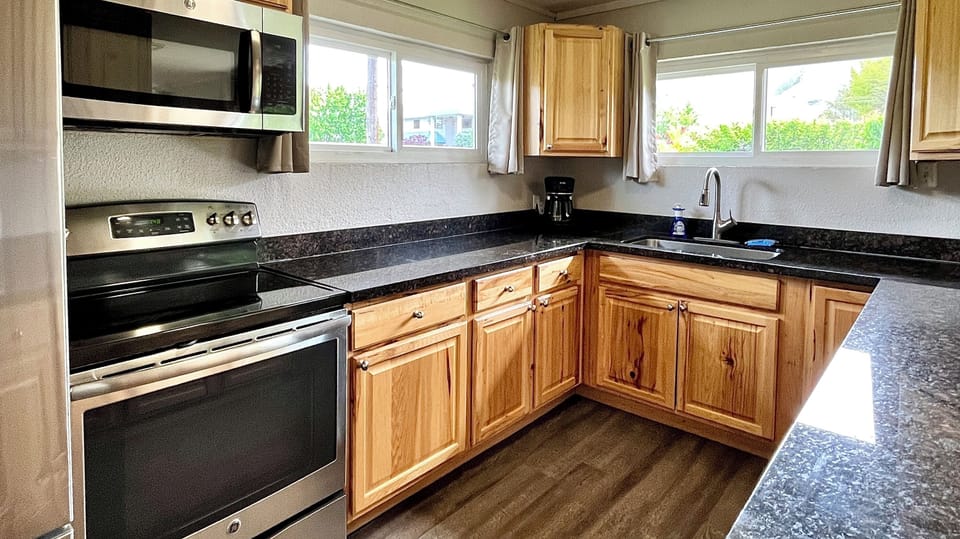 Kitchen with granite countertops and stainless steel appliances