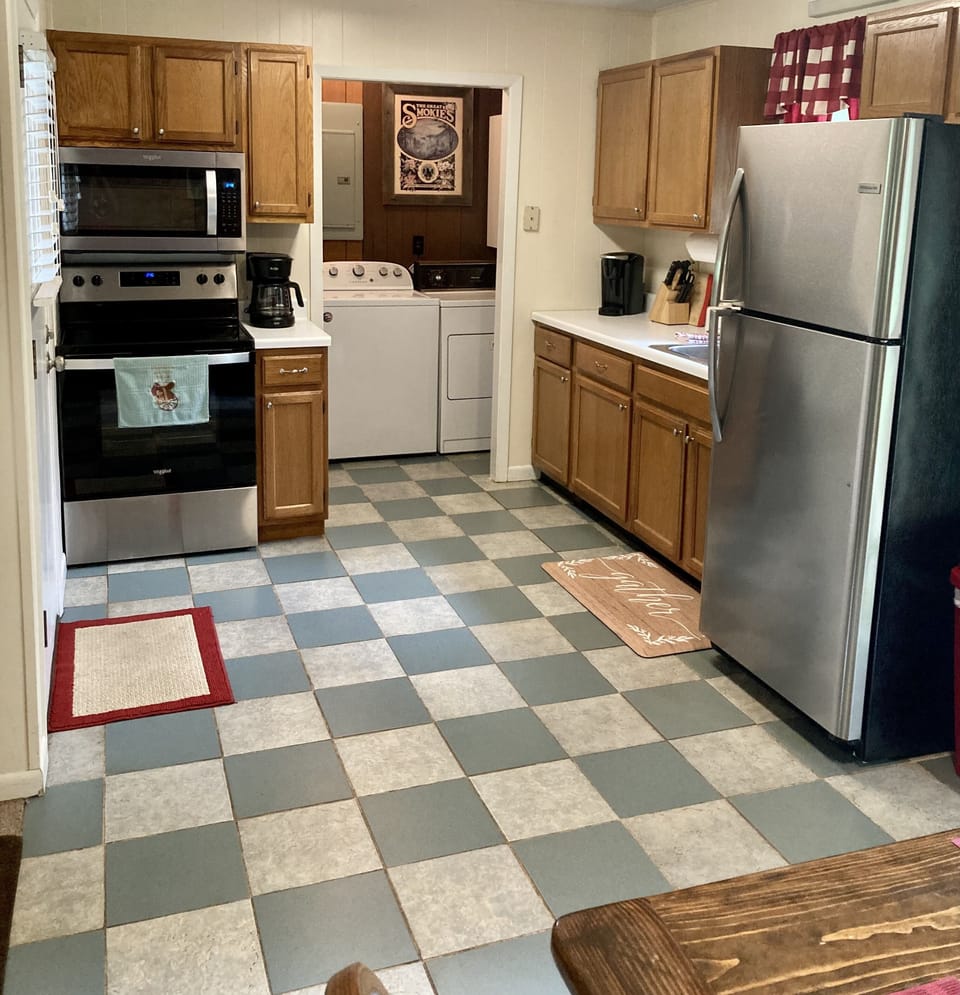 Fully equipped kitchen includes regular coffee maker and Keurig.