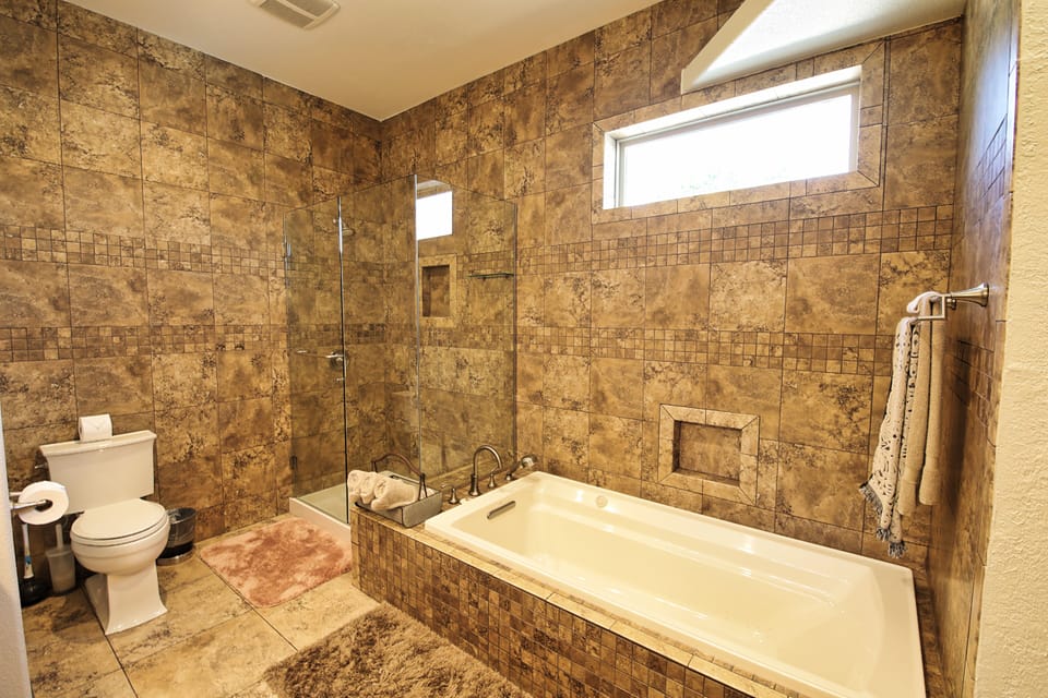 Master bathroom jetted tub and walk in shower
