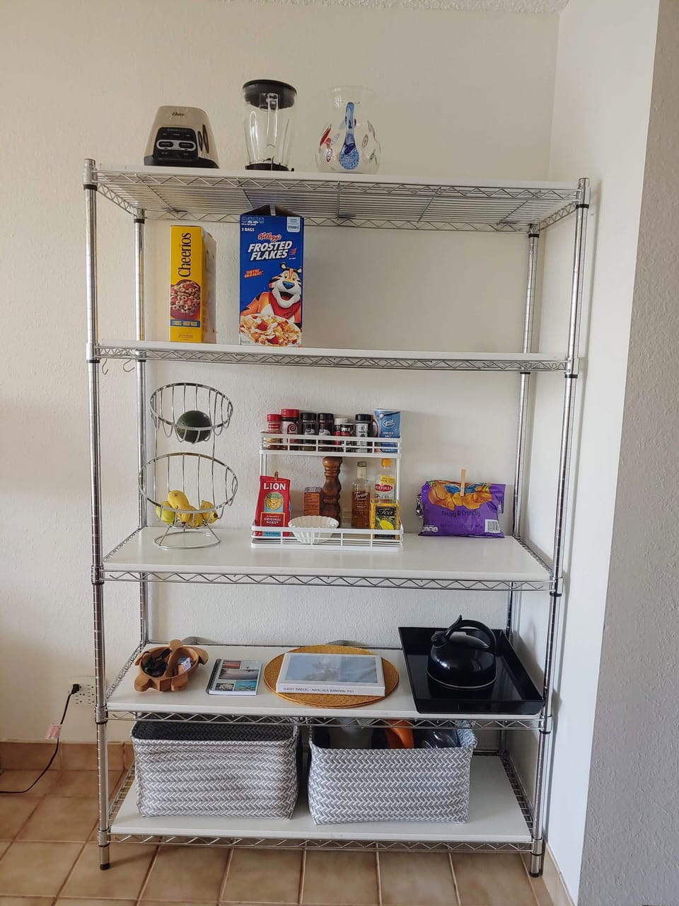 New pantry style shelving next to the kitchen