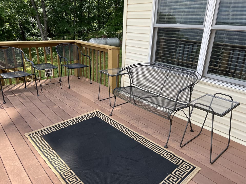 Upper level balcony off the dining room.  Overlooks lake, dock, and lower decks.