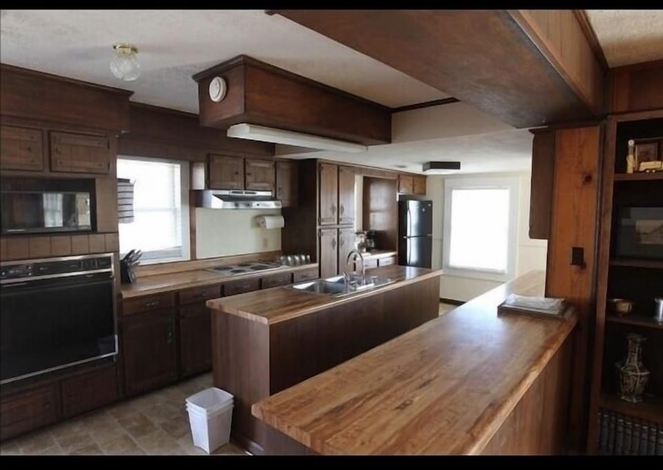 Upper level galley kitchen.