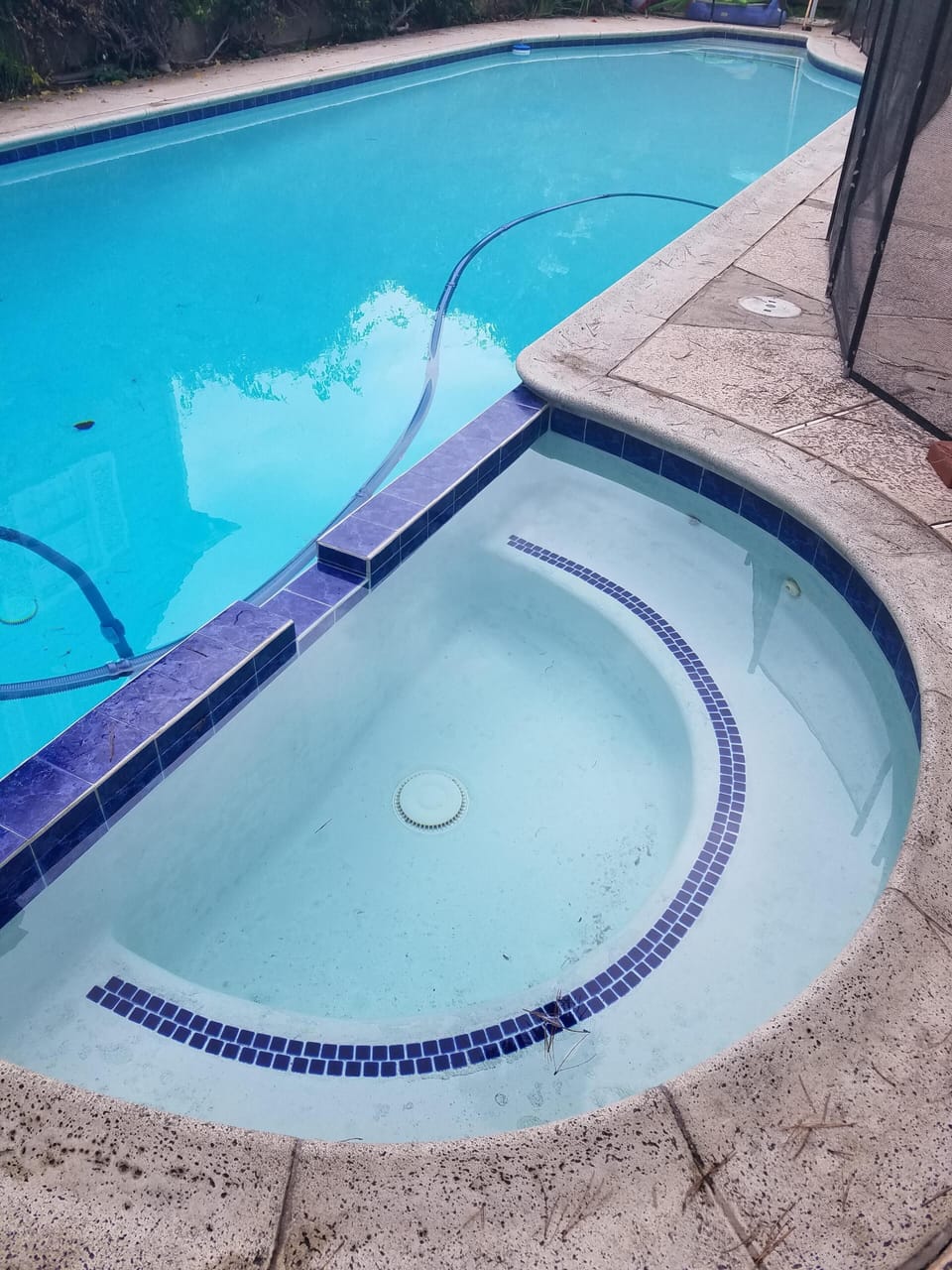 Pool showing attached spa