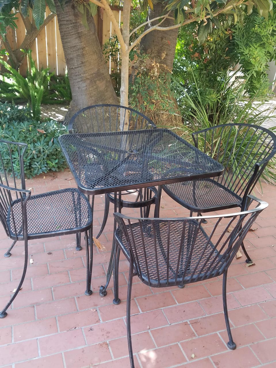 Seating for four to side of rear patio