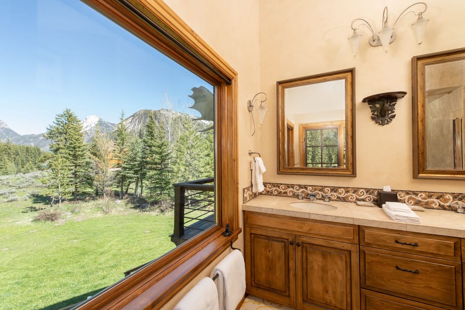 Upstairs bathroom. Anywhere in this house you'll be in awe of the views.