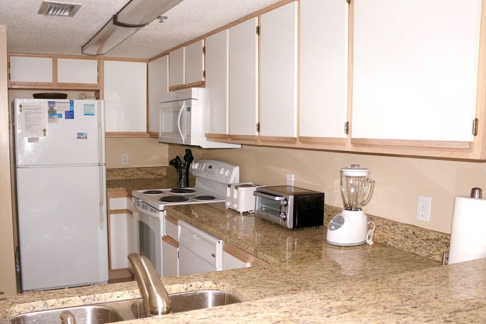 Kitchen with new granite counters and new cabinets