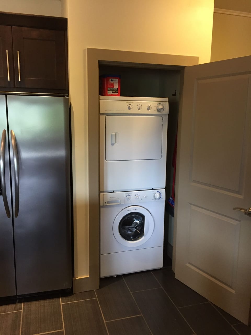 Washer and Dryer closet beside the kitchen