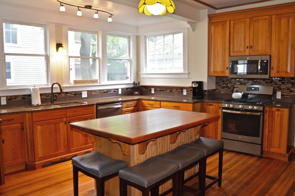 Well stocked chef's kitchen. Small appliances and quality cooking supplies. 