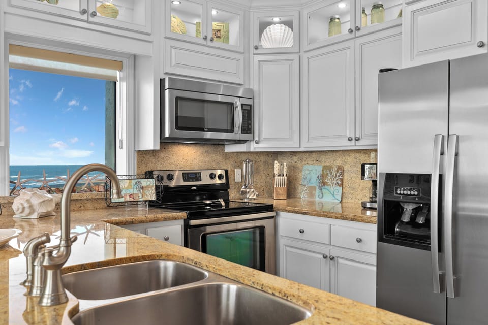 Ocean Views from Kitchen, undercabinet lights. Carafe & Keurig Coffee Makers.
