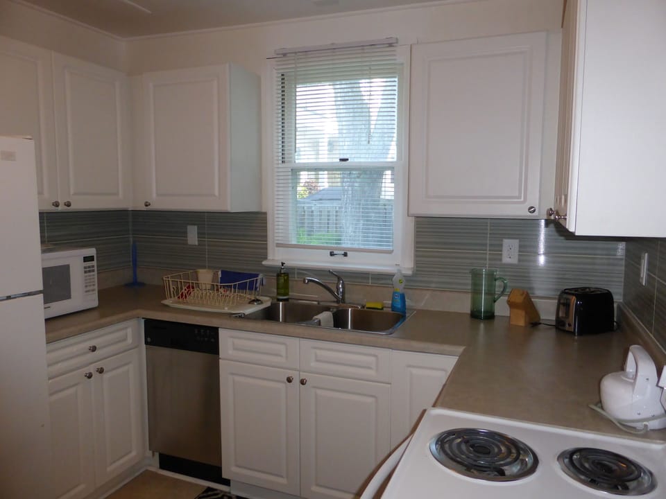 Brand new kitchen with new oven, dishwasher, microwave