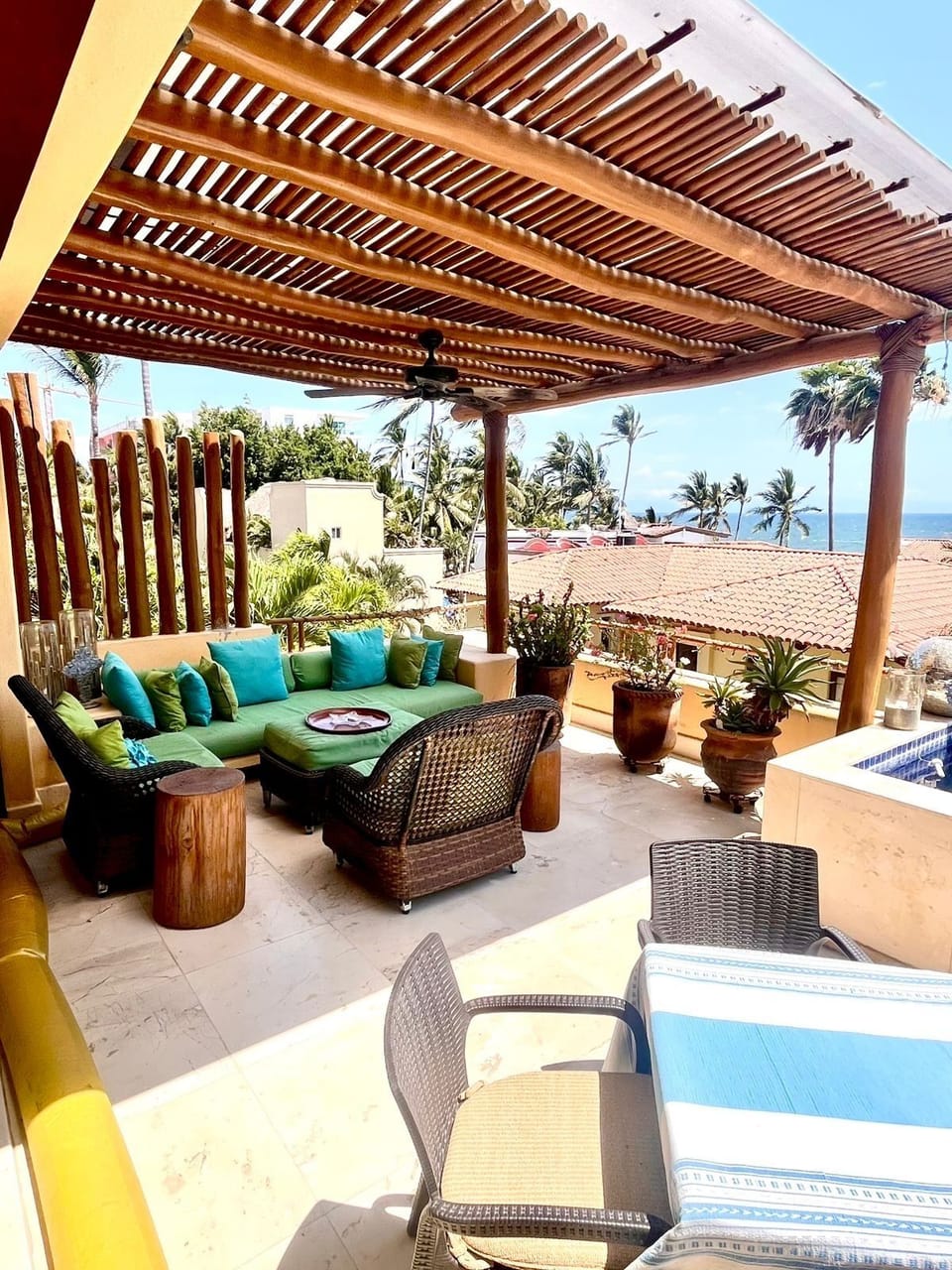 Relax on the patio deck sheltered under the pergola. 