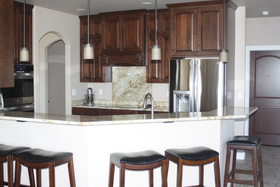 Kitchen and Bar Area that can seat 5
