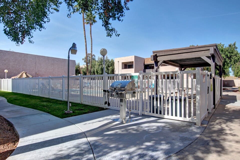BBQ and pool area just steps away from condo
