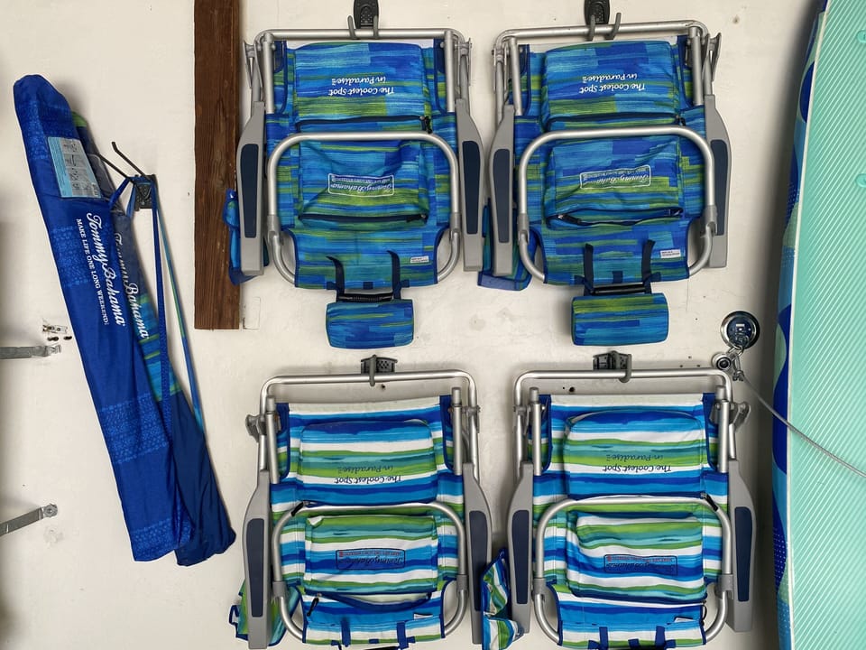 4 beach chairs and 2 umbrellas included! 