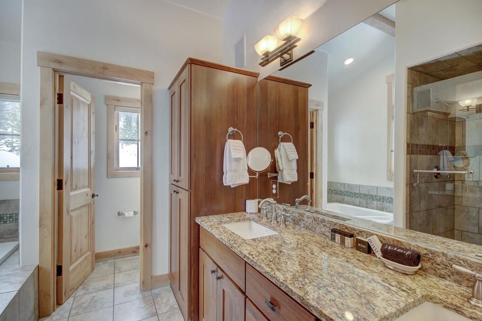 Master bathroom - main level - with bath and separate shower