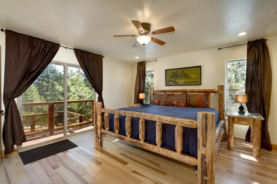 Middle level master bedroom, with stair to from deck