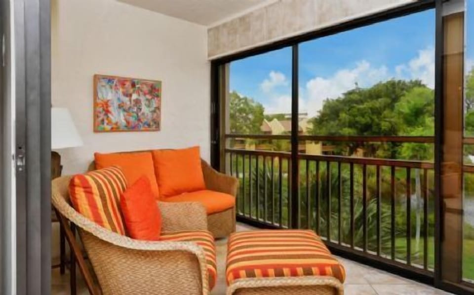 Seating Area in Enclosed Glass Lanai