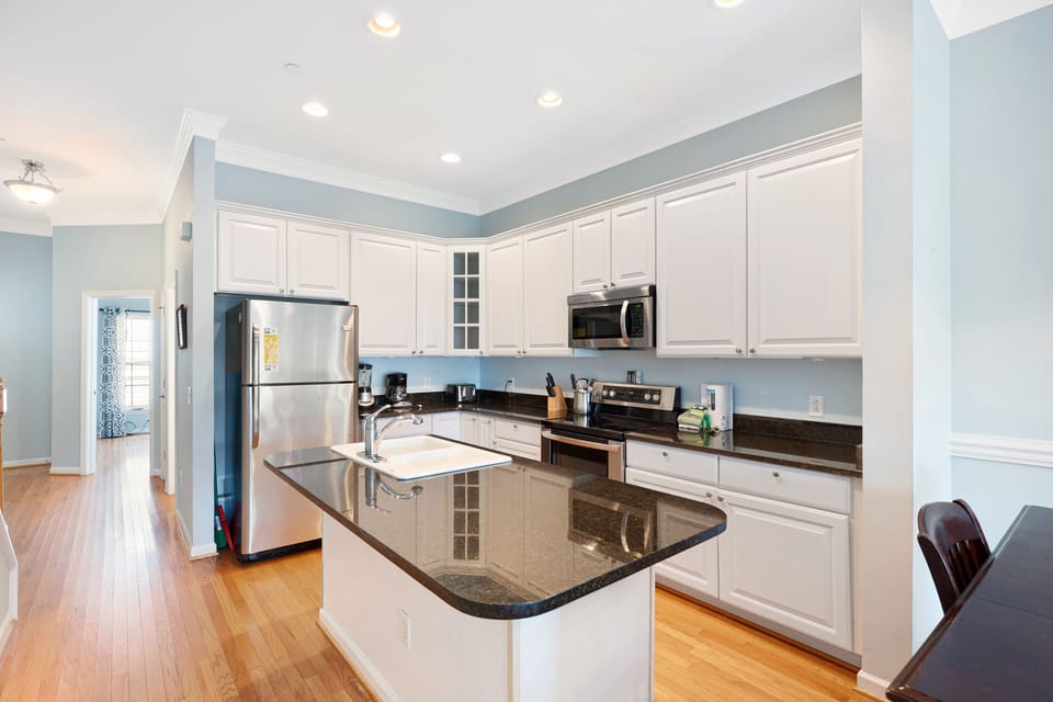 Fully equipped-kitchen with stainless steel appliances