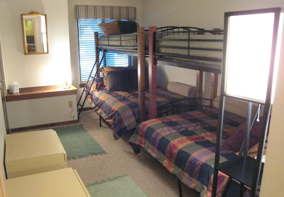 Third Bedroom / Bunk Room (two full-size beds below, two twins above)