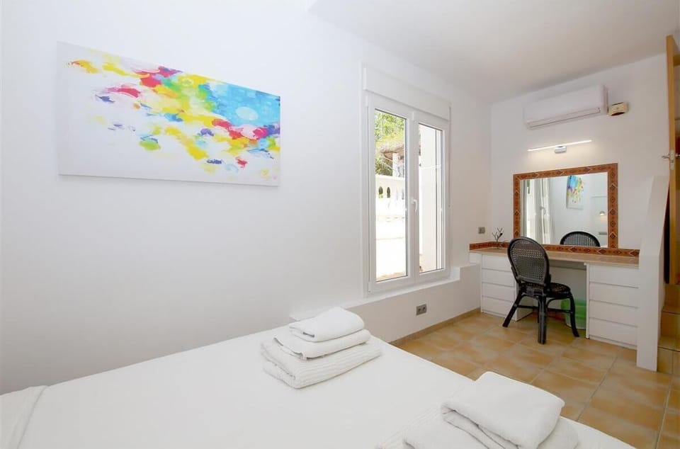 Another view of the third room with boudoir and views to the gardens and pool