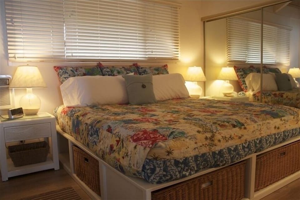 A king size bed in the Master Bedroom