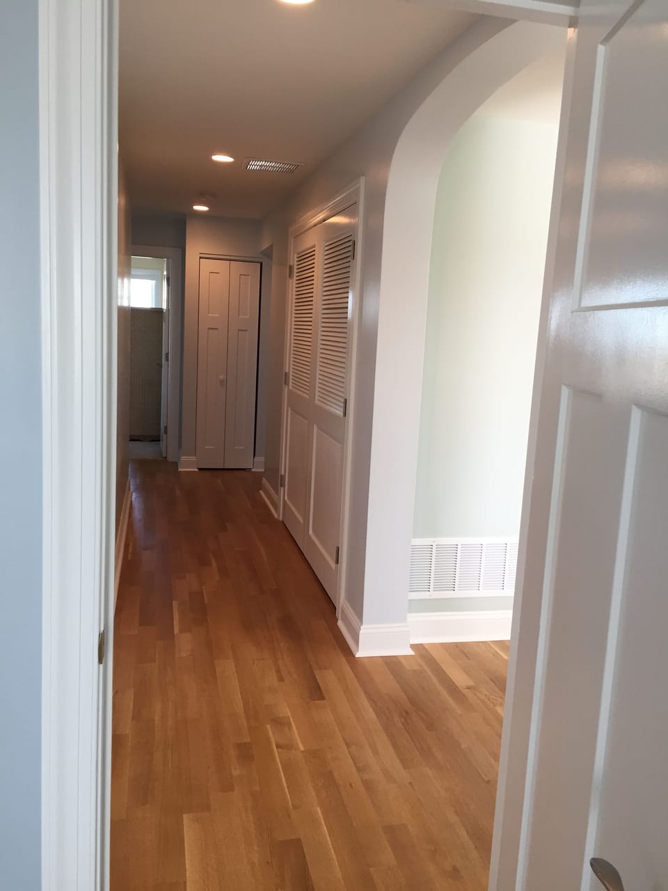 2nd floor hallway to three more bedrooms, full bath and laundry.  