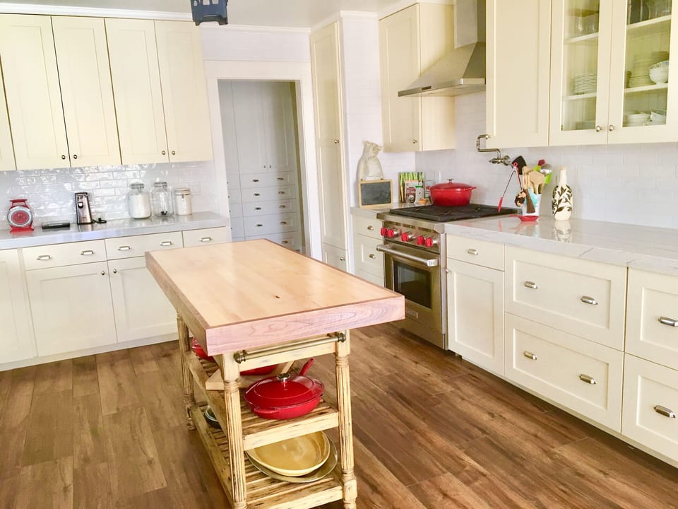 A chef's kitchen with a wolf stove