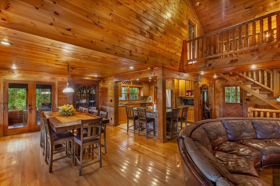 Spacious Open Floor Plan Connects Living Area, Kitchen, and Dining Room