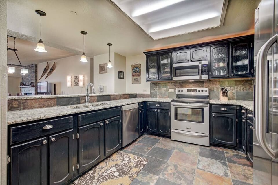 Kitchen includes a convection microwave.