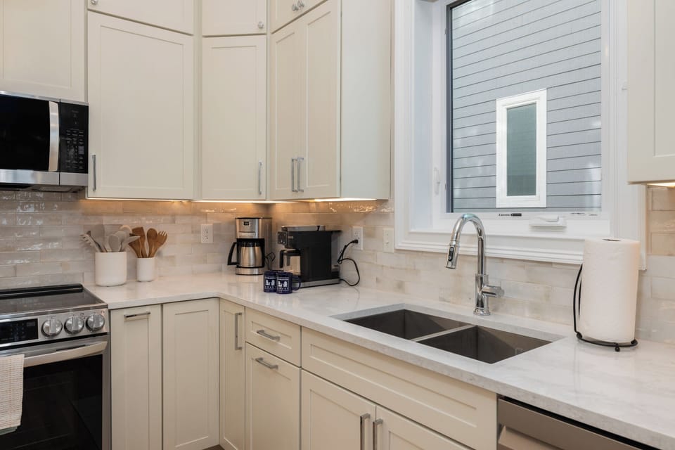 Your newly renovated kitchen features deep sinks