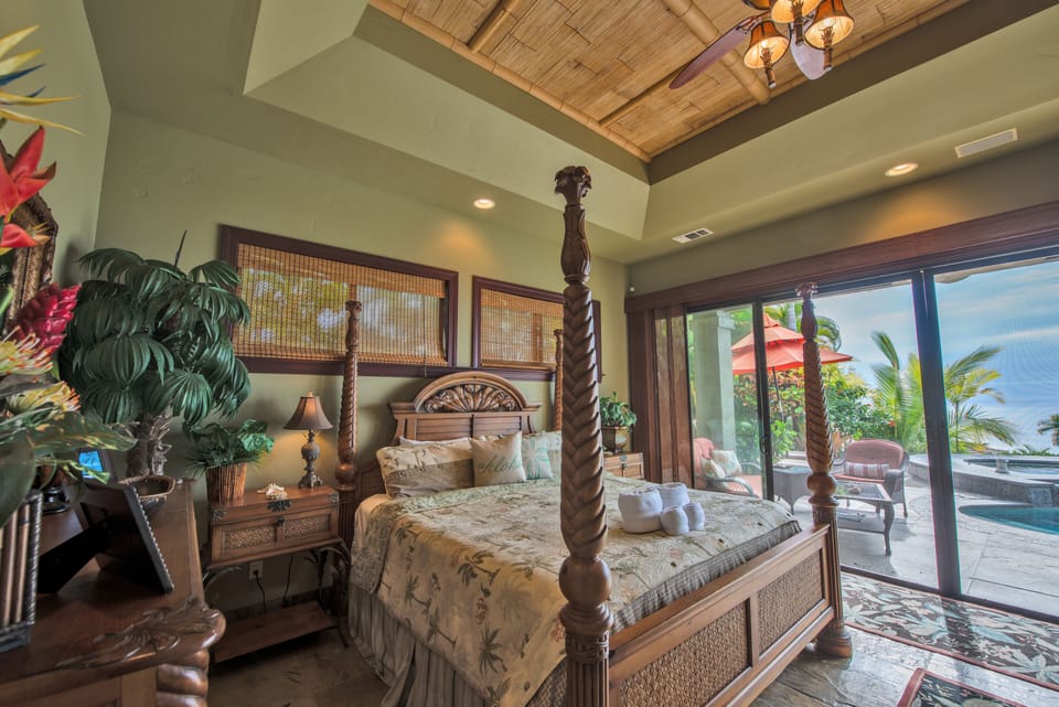 Mater bedroom with king-size bed & plantation-style furnishings. Views of ocean!