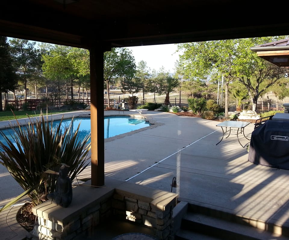 Poolside outside living room main house