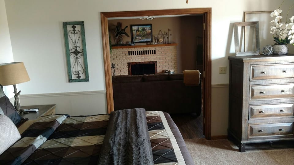 Master bedroom looking into den.. french doors can be closed between the rooms
